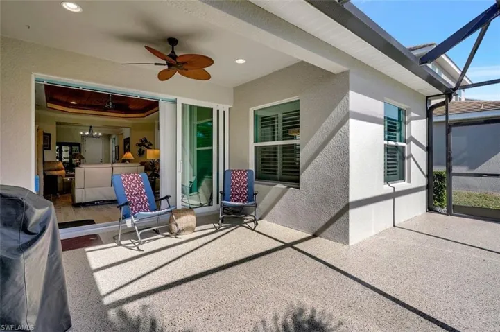 Enjoy the covered lanai & the view from the large area.  The floor has new epoxy.