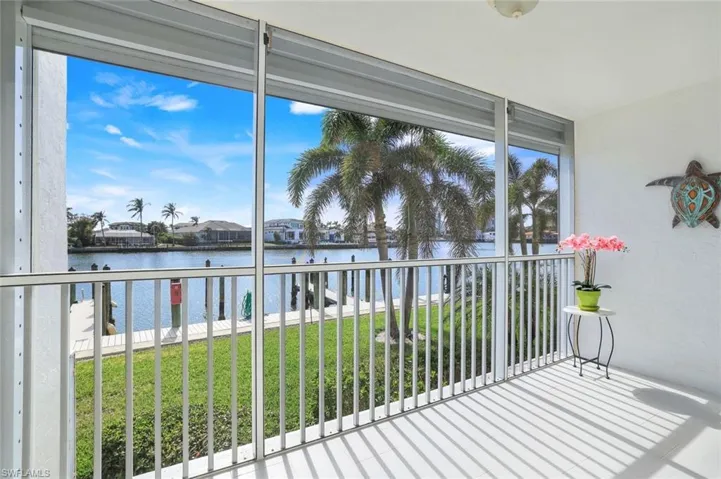 Screened lanai. Easily converted to extra living space if desired. Lanai is 55” above the ground level.