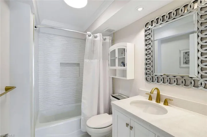 Full bathroom with shower / bath. Gorgeous tile and fixtures.  All new!