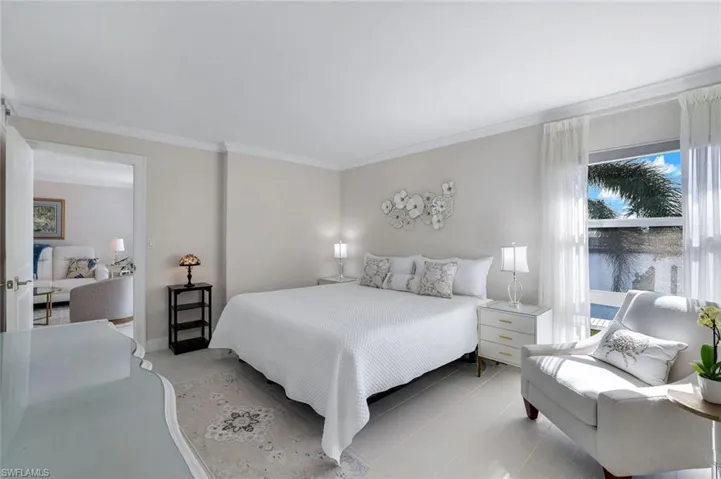 En-suite master bedroom. Water view! Crown molding. Fully tiled.