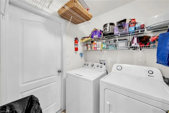 Laundry area featuring washer and clothes dryer