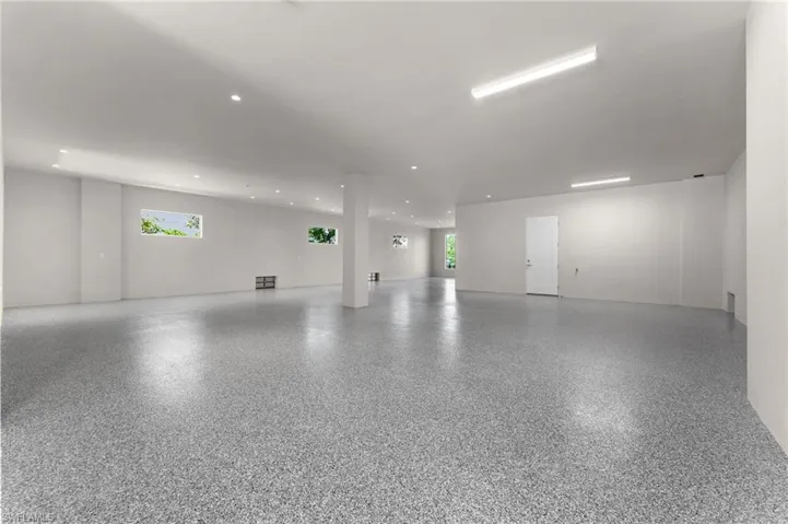 Garage featuring recessed lighting