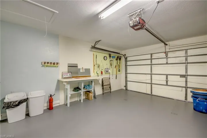 GARAGE NEWLY PAINTED AND SEALED.  NEW GARAGE DOOR OPENER 2022