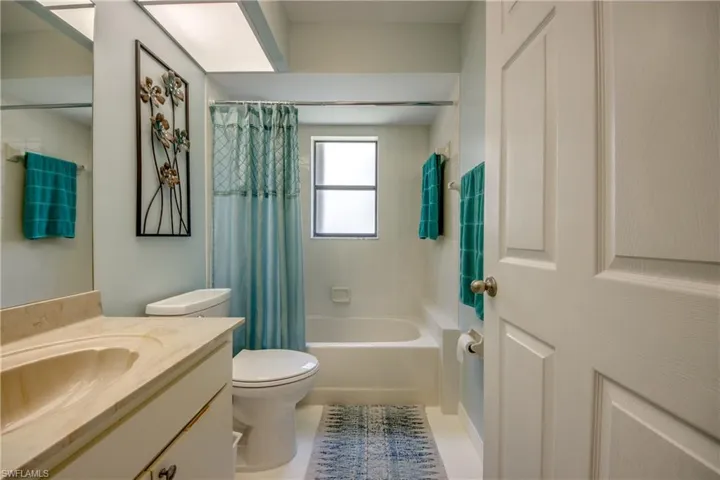 GUEST BATH WITH NEWER COMMODE