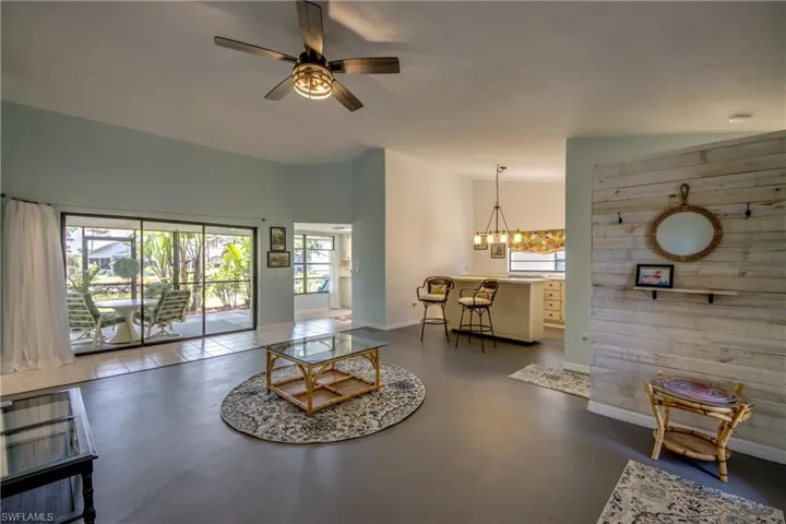 GREAT ROOM LOOKING TO DINING ROOM.  NOTE THE PRIVACY WALL FOR GUEST BATH.