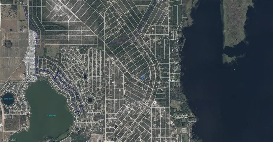 Aerial Survey Map. Illustrating property divisions and water bodies within a defined region