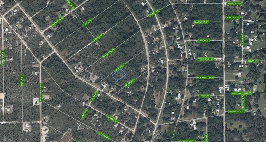 Aerial View. Highlighting the property's location and surrounding infrastructure