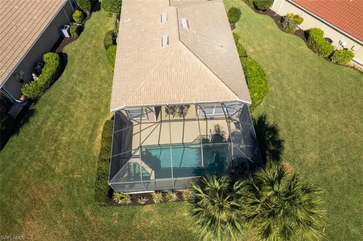 View of subject property with a pool
