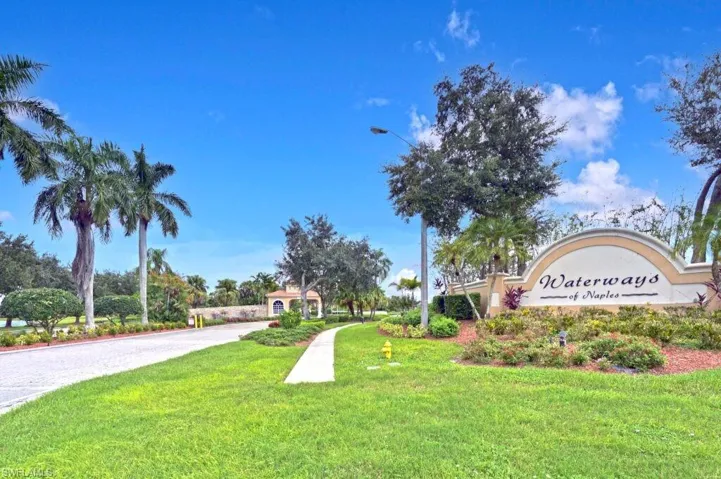 View of property's community with a yard