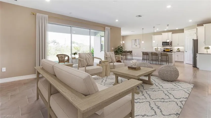 Living room with light tile patterned floors