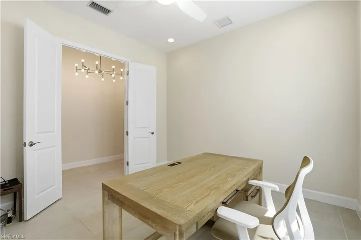 Enter the office through French doors from the foyer