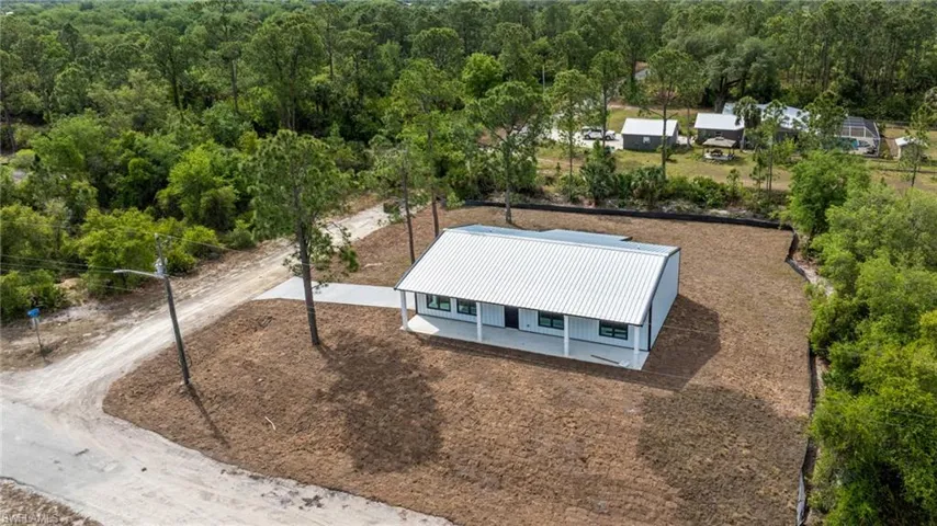 Aerial view with a wooded view