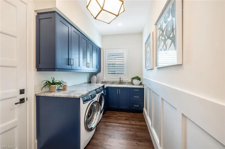 Laundry, one of two entrances to home via Garage.