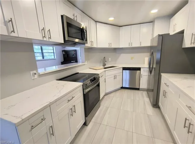 Quartz countertops, new cabinets
