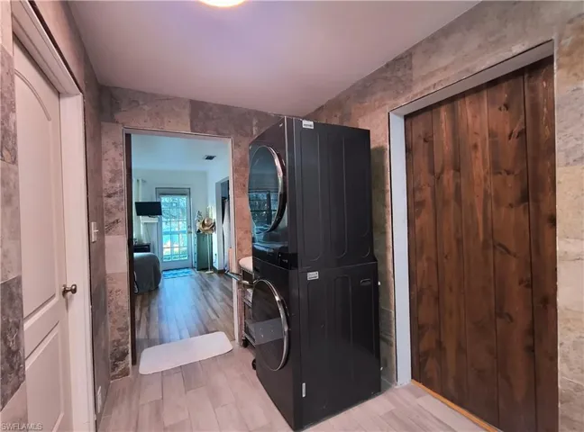 Primary Bath with laundry and walk-in closet