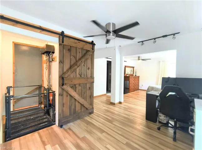 Primary Bedroom with elevator from main floor