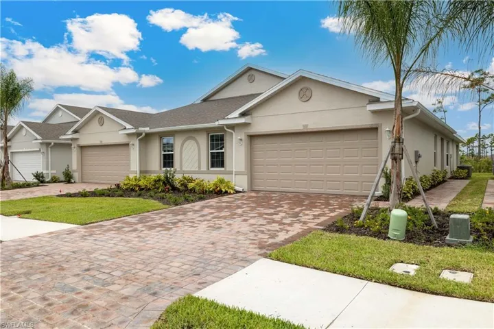 Ranch-style home featuring a garage