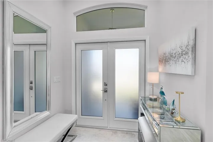 Bathroom featuring a stall shower and a freestanding bath