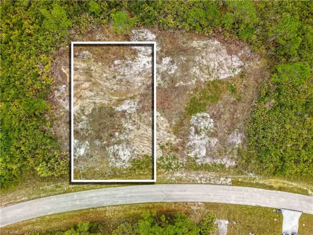 Aerial view of property's location with property parcel outlined