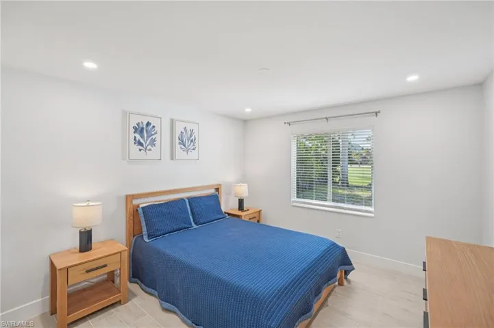 Bedroom featuring recessed lighting and light wood-style flooring