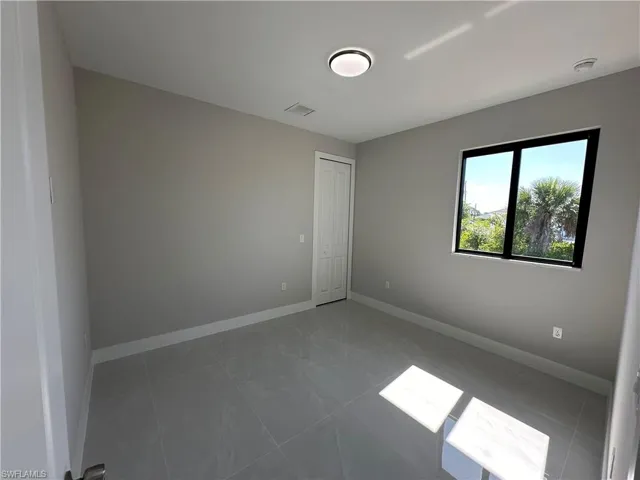 View of tiled empty room