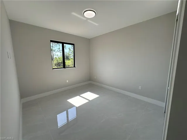 View of tiled spare room