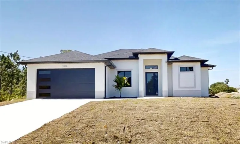 Prairie-style house featuring a garage