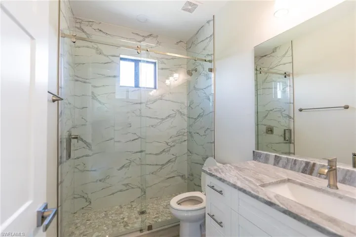 Guest Bathroom with access door to future pool