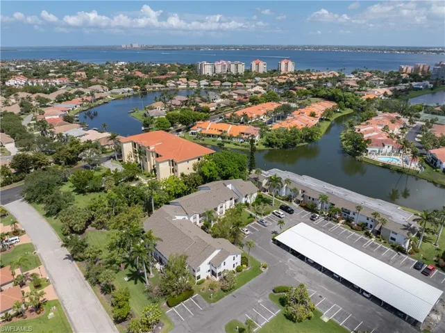 Aerial view of residential area with a large body of water