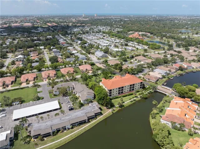 Aerial overview of property's location featuring a nearby body of water