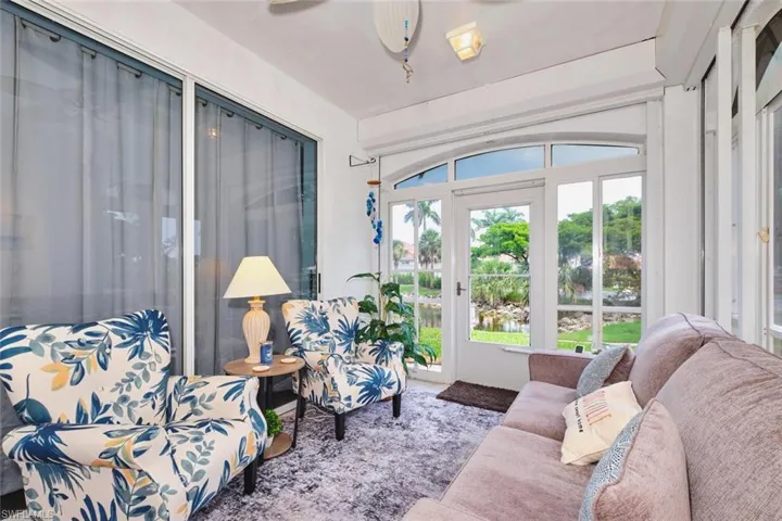 Living area featuring ceiling fan