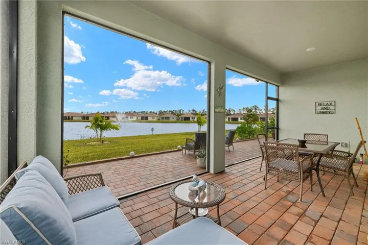 Sunroom with a water view