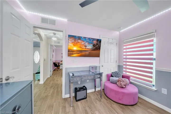 Living area with wood tiled floors