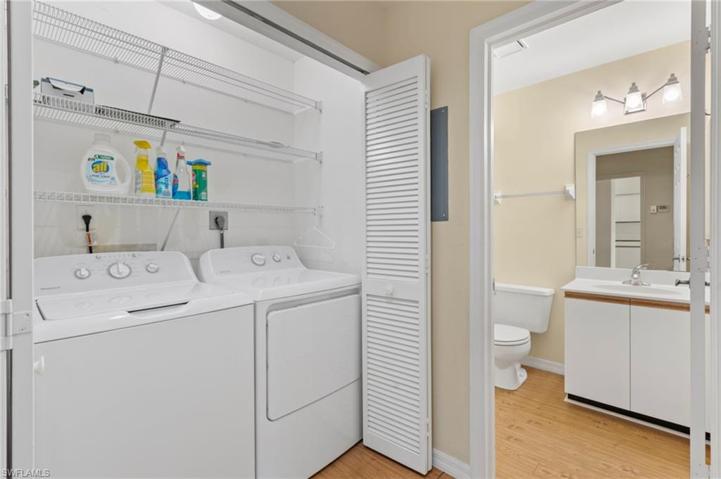 Well organized laundry with shelfs & more