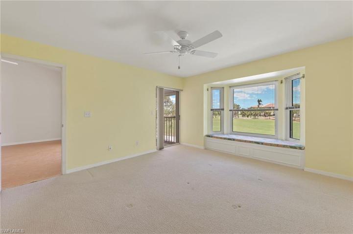 Spacious master suite with slider to lanai