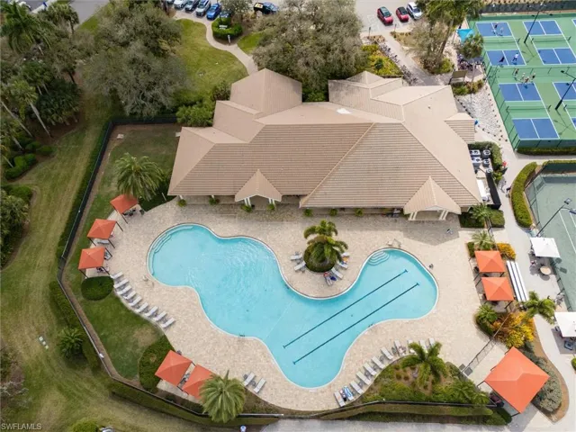 Community pool featuring a patio area