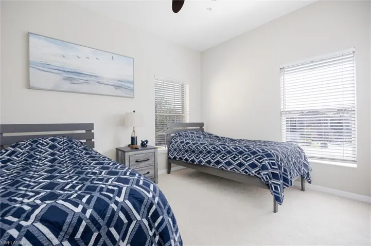Bedroom featuring carpet floors and a ceiling fan