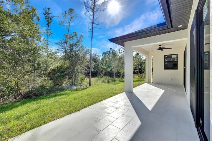 View of patio with a ceiling fan
