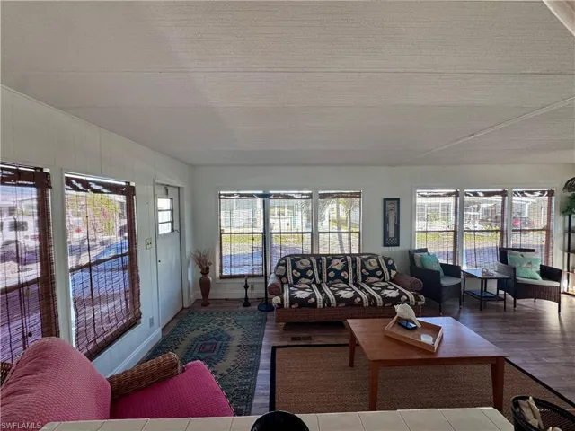 Living area with wood finished floors