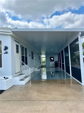 Entrance to property with a carport