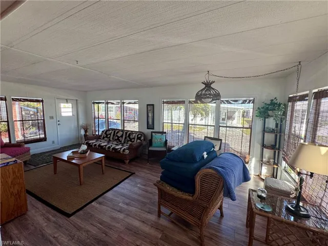 Living area with wood finished floors