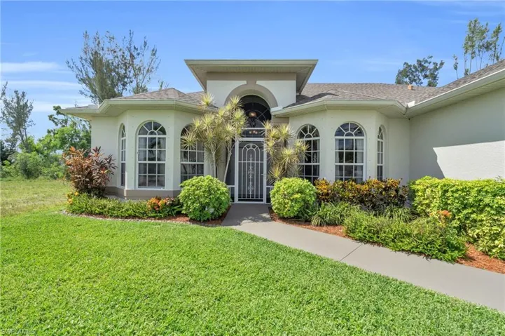 View of front of home with a front yard
