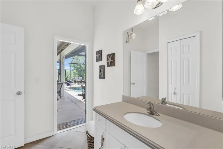 Bathroom featuring vanity and tile patterned flooring