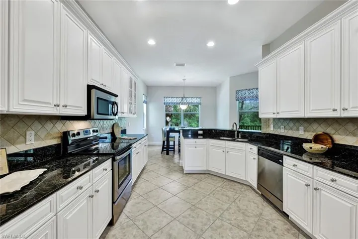 Kitchen with processional refaced cabinets