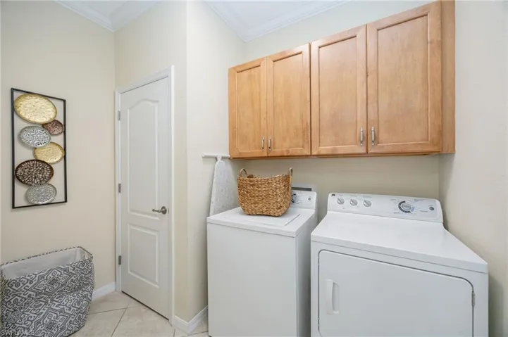 spacious laundry room with extra storage