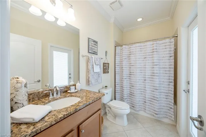 Guest bathroom doubles as a pool bath for your future pool!