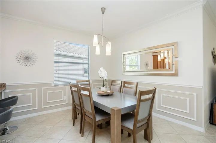 Beautiful chandelier and applied moldings