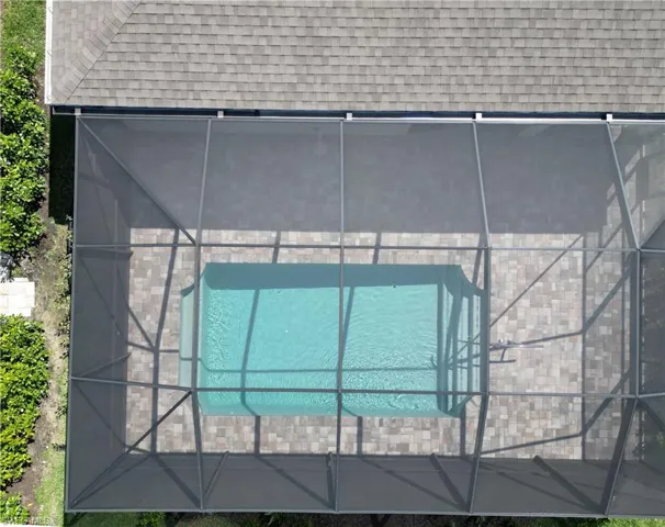 Exterior details featuring a shingled roof