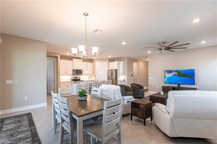 Dining area featuring baseboards, visible vents, and recessed lighting
