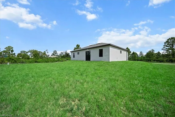 1144  Mobley E ST, Lehigh Acres, FL 33974
